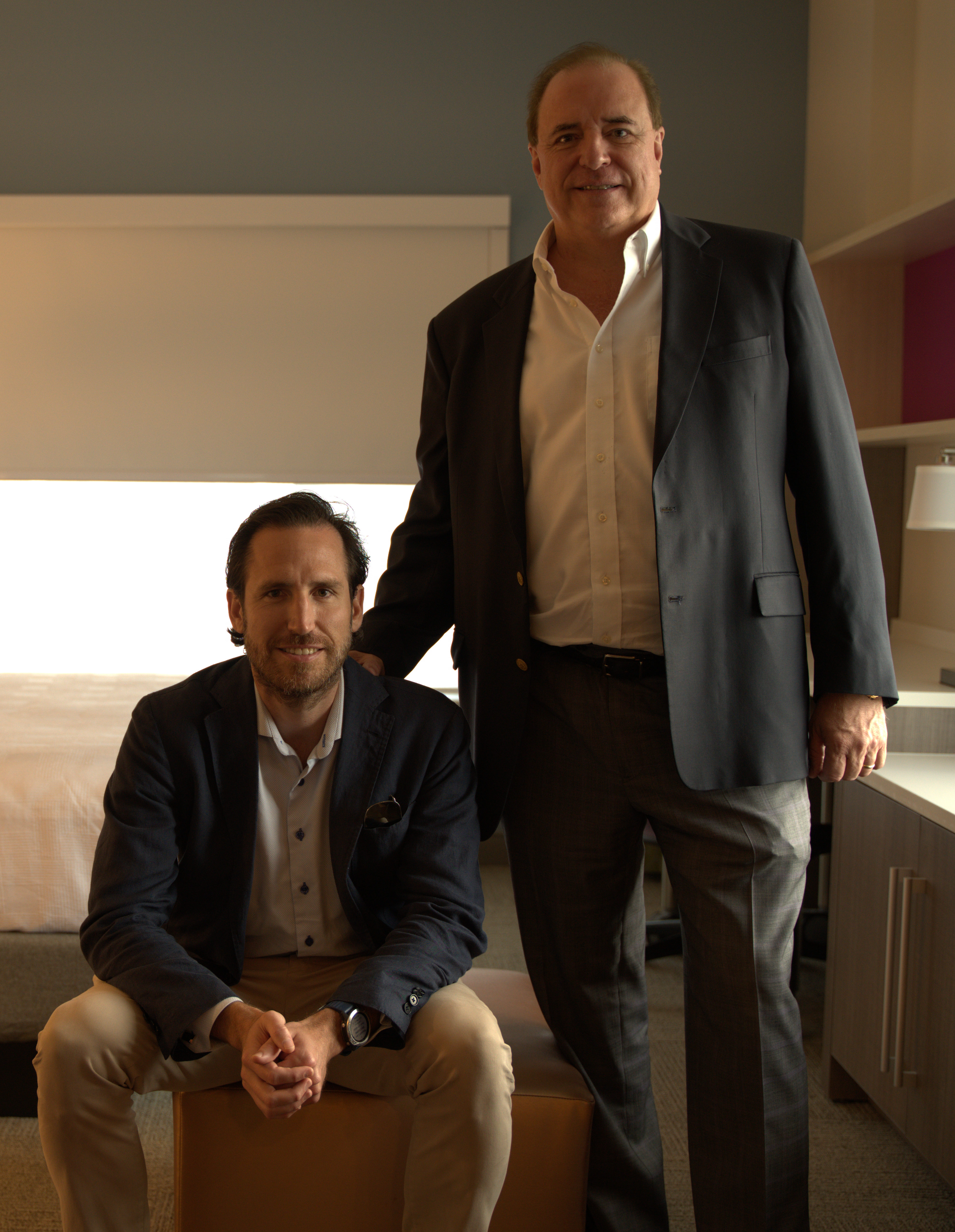 Photo of Carlos Jr. and Carlos Sr. in a Hotel