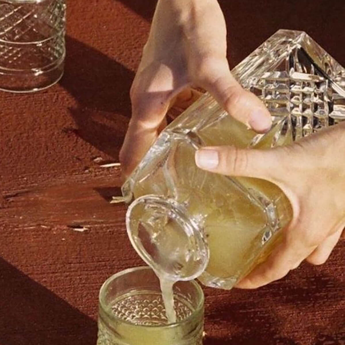 Pouring drink into a glass