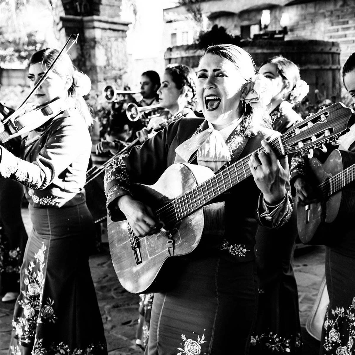 Woman singing with guitar
