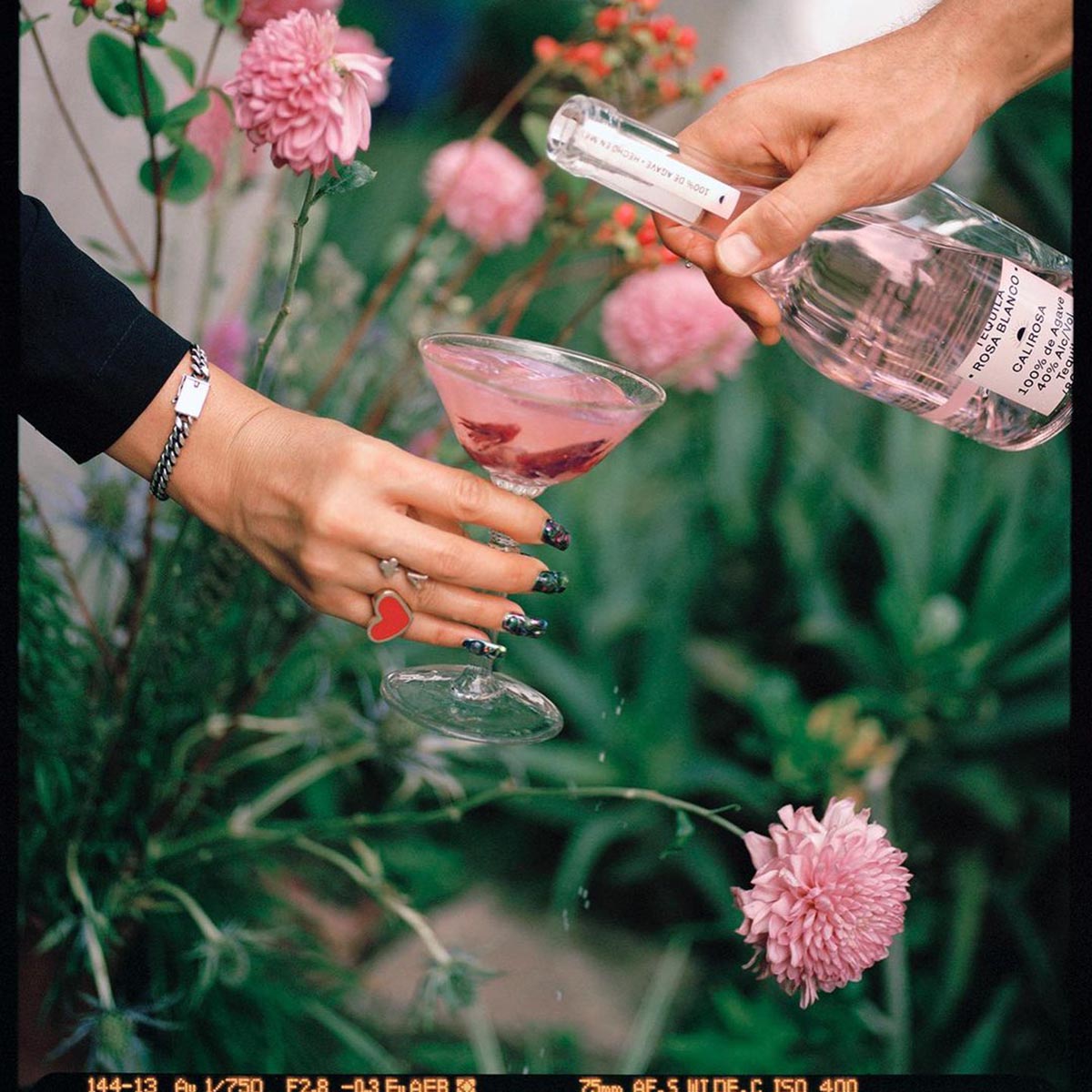 Calirosa Rosa Blanco tequila poured into glass