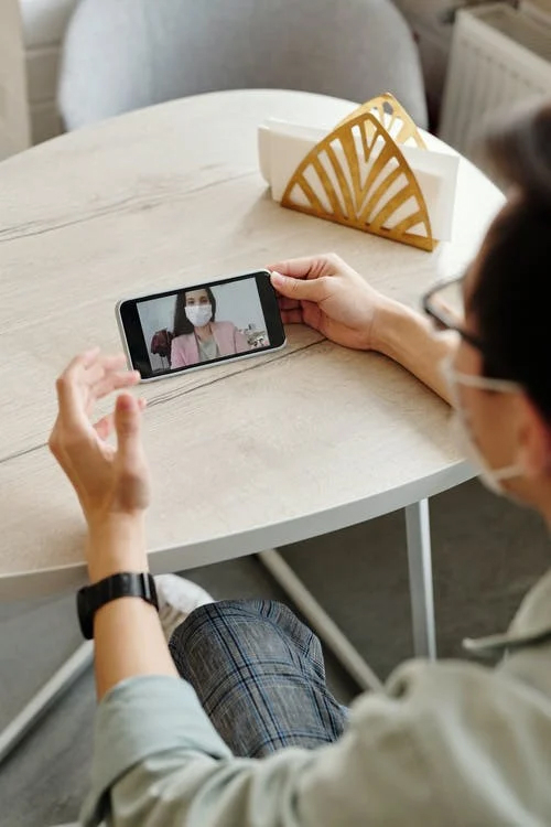 Man talking via face cam