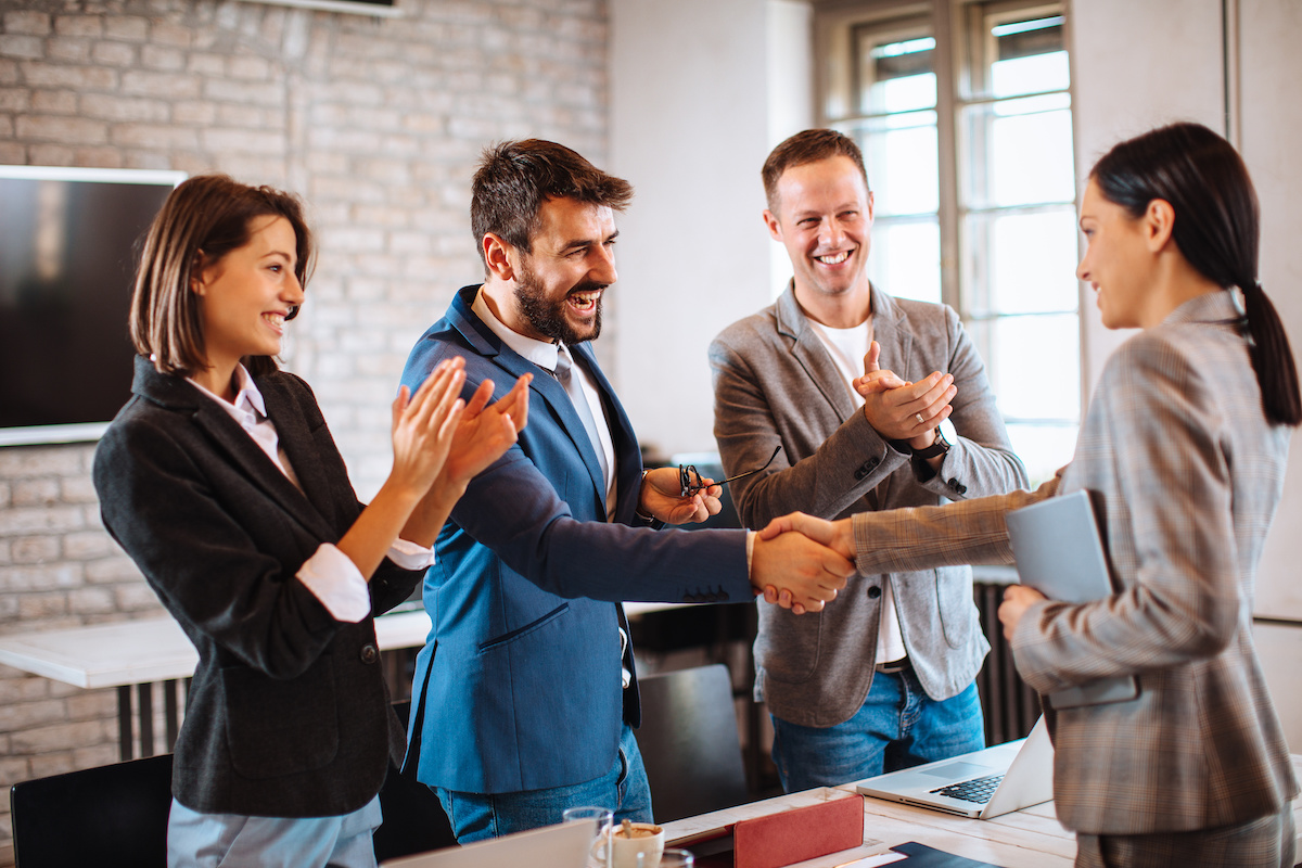 interview team shaking hands