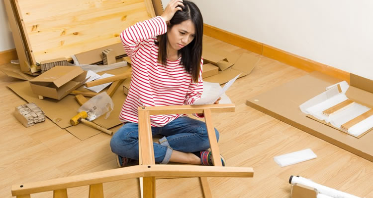 image of woman fixing a chair