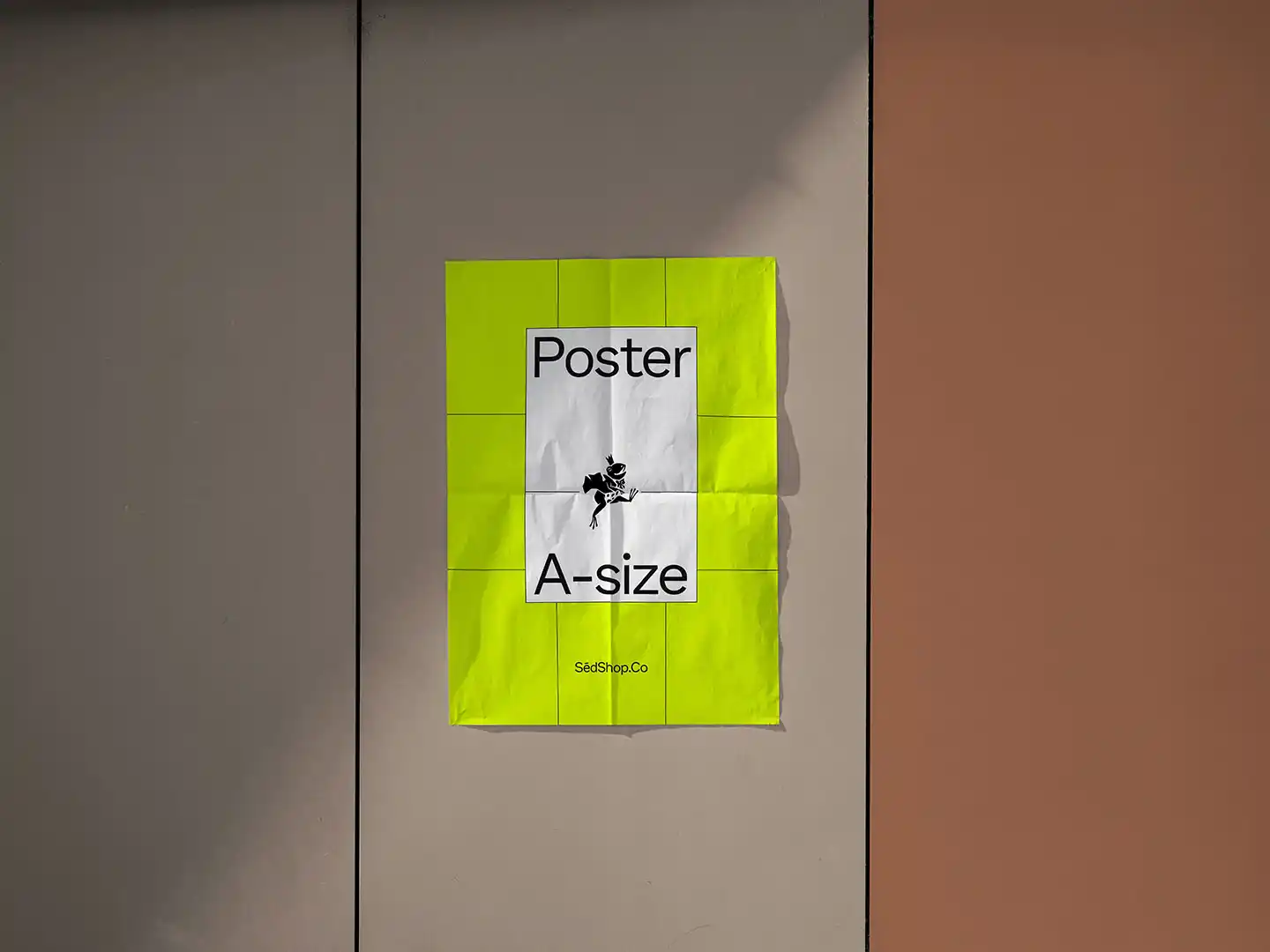 Mockup featuring a bright yellow A-size poster with 'SedShop.Co' branding on a metallic grey wall.