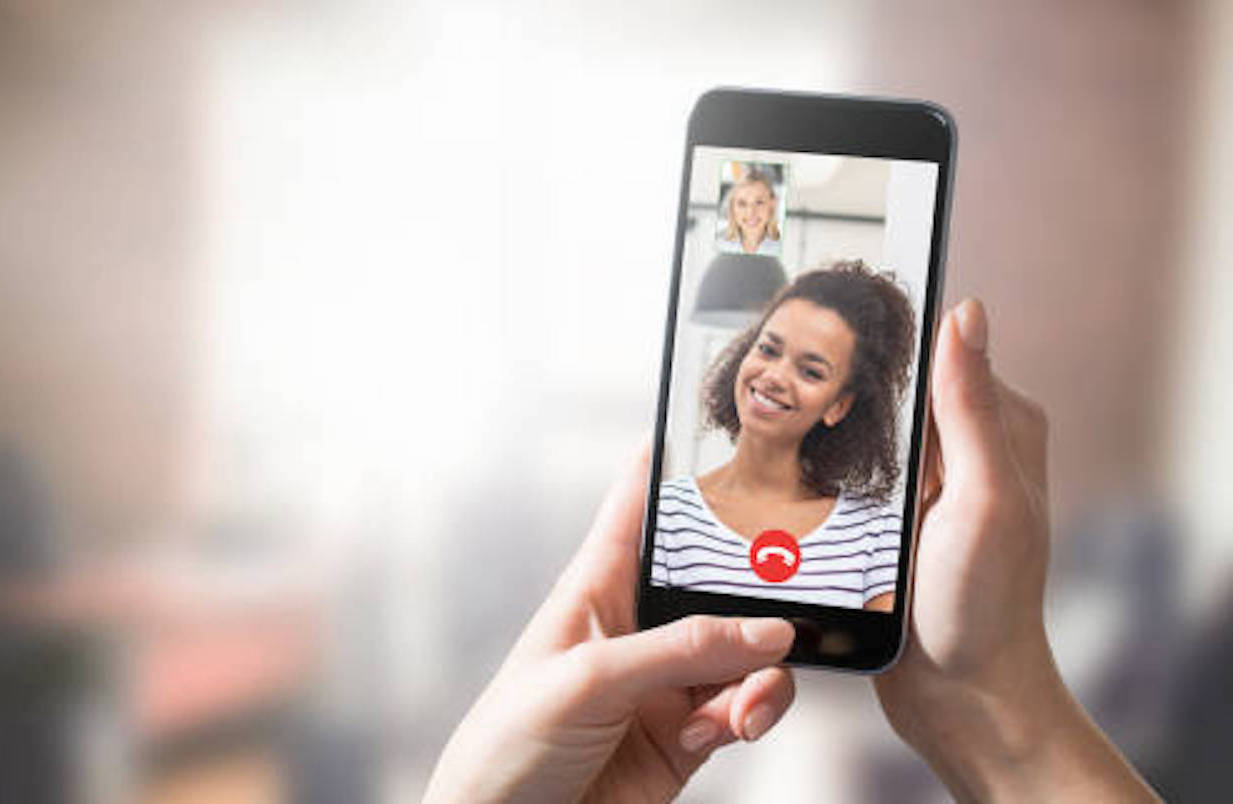 two girls face timing