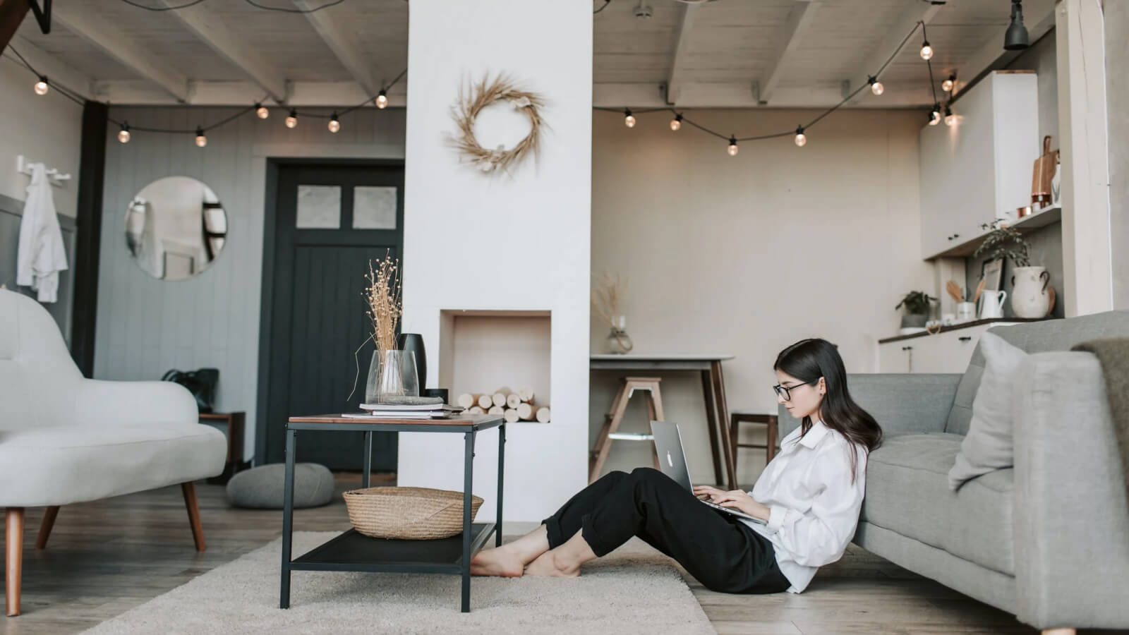 Background image of person sitting in lounge