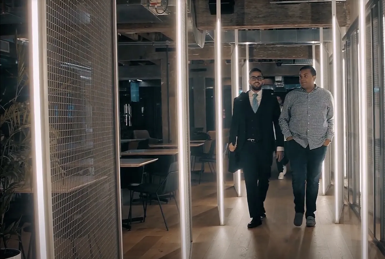 Background image of Arjun with InvestorKit customer Joseph