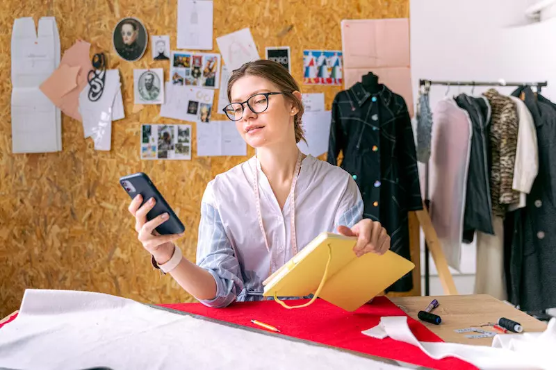 A lady making clothes design at home