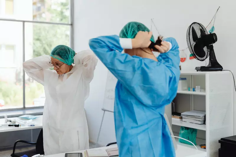 2 doctor wearing wig in the hospital