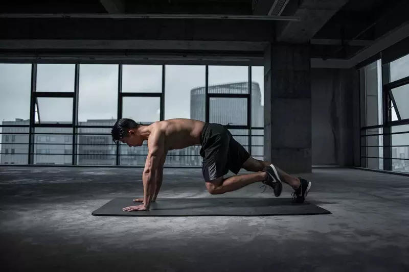 A man doing push up at fitness center 