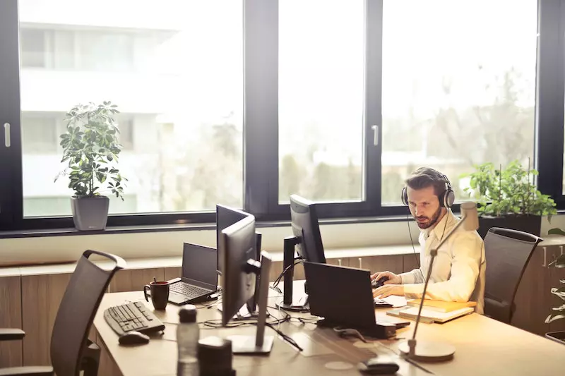  A man using computer at office