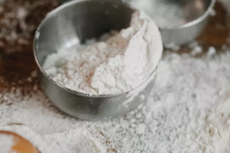 A bowl of flour shown in image