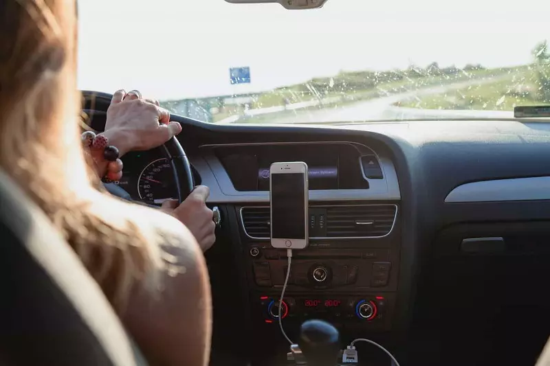 A lady driving a car