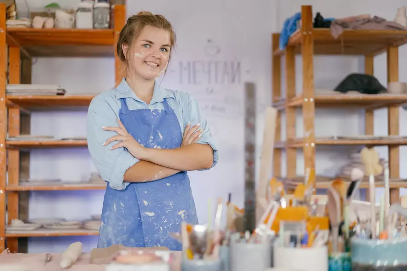 A lady making painting