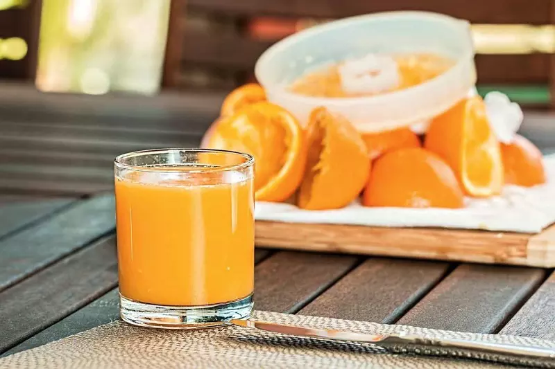A glass of juice shown in image