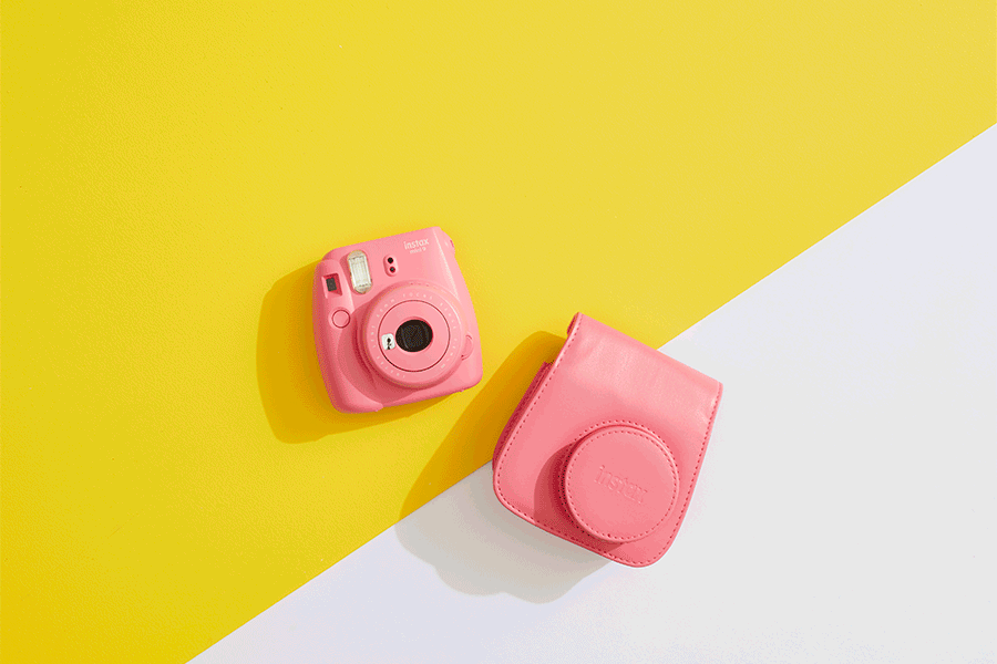 Kids can create a DIY holiday journal as a photo scrapbook with an instant camera.