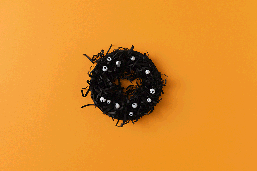 A wreath with eyeballs? That’s a cool Halloween crafts project the kids will love.