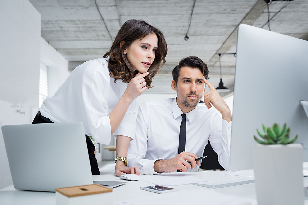 Business owners reviewing their financials