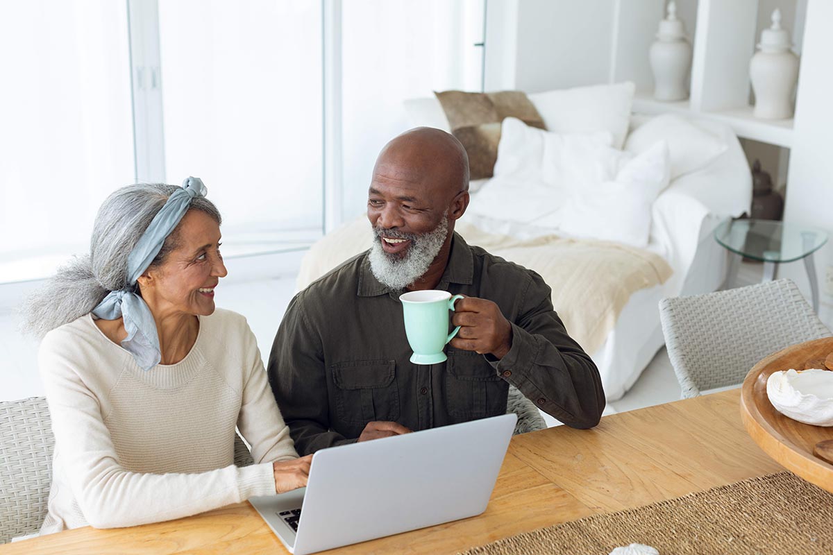 A man and woman at a computer