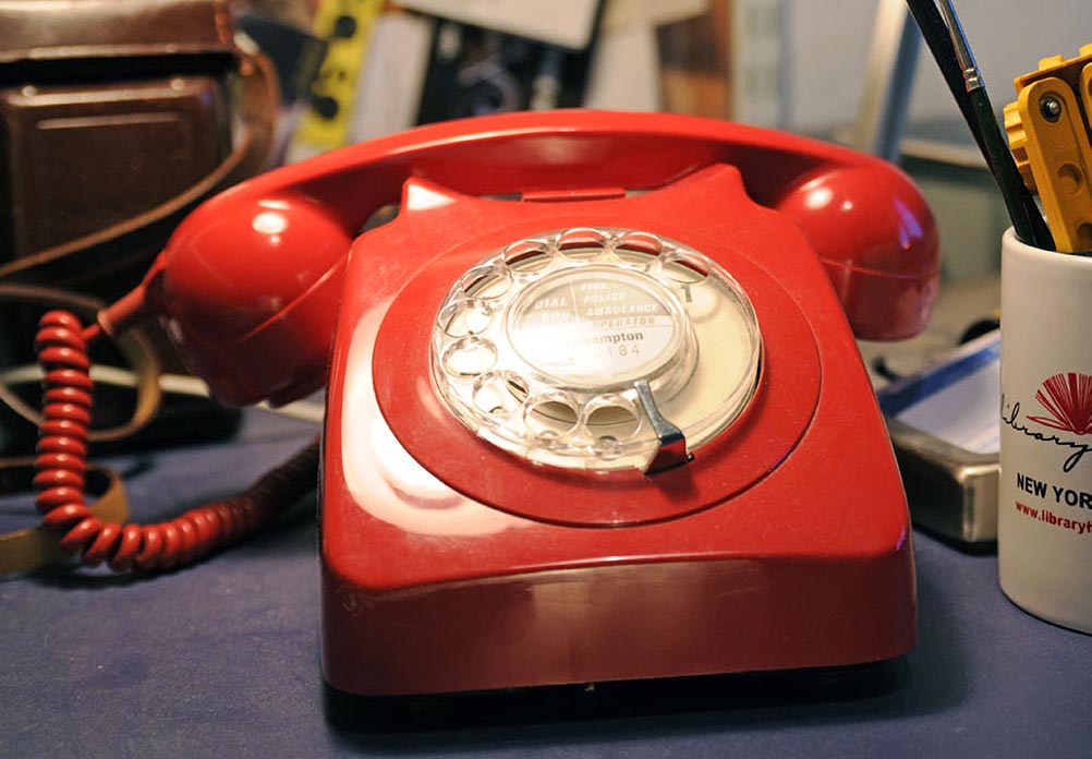 A red rotary phone