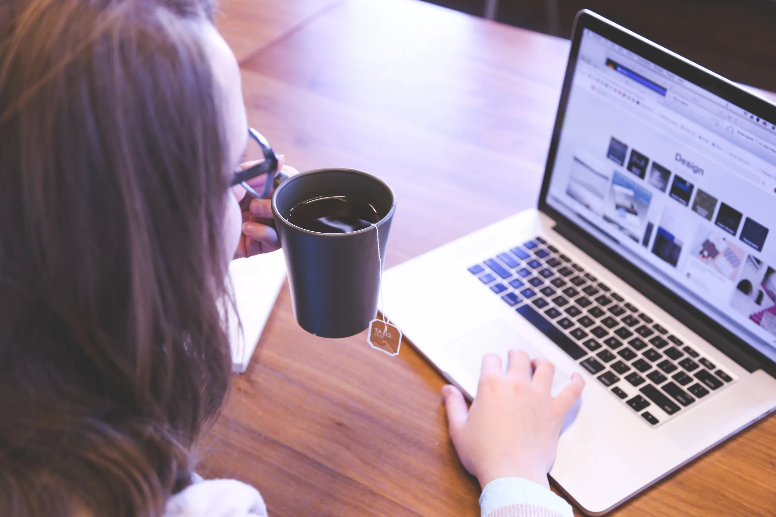 Woman on a laptop, finding the right balance for her website