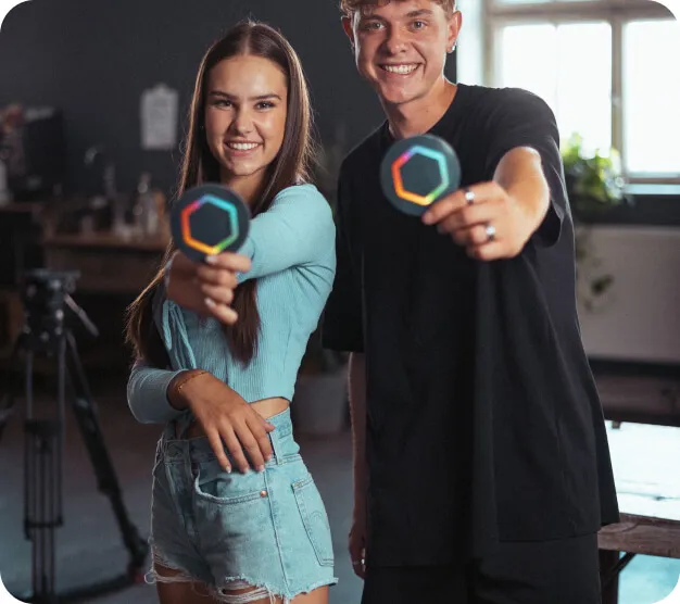 A girl and a gay showing simple club hexagon - SImple Club