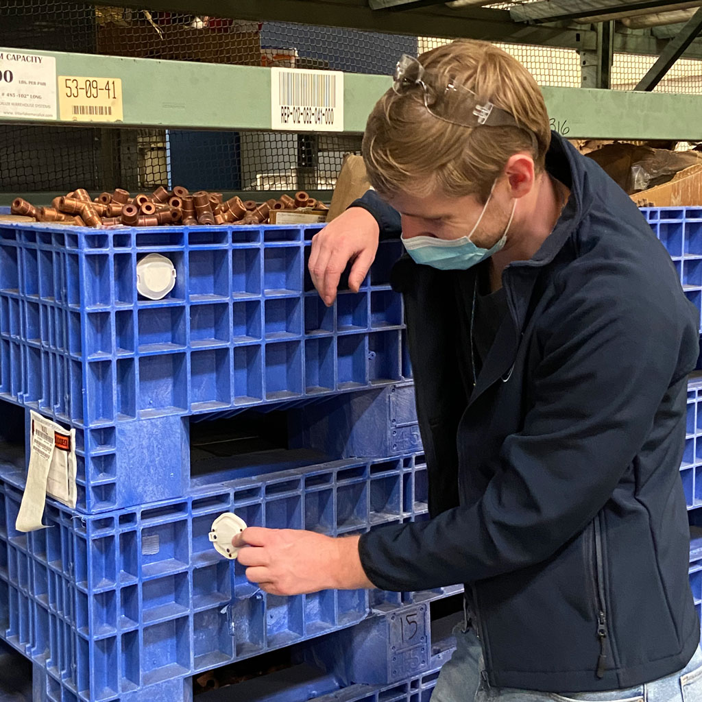 An industrial tag is being put on an asset.