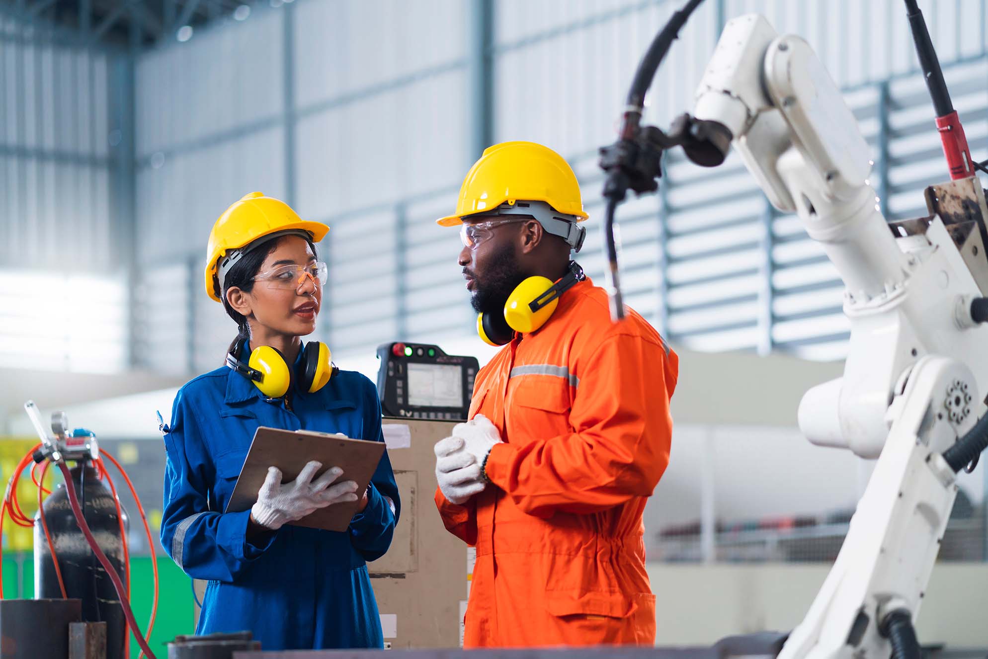 Two process engineers discussing work.
