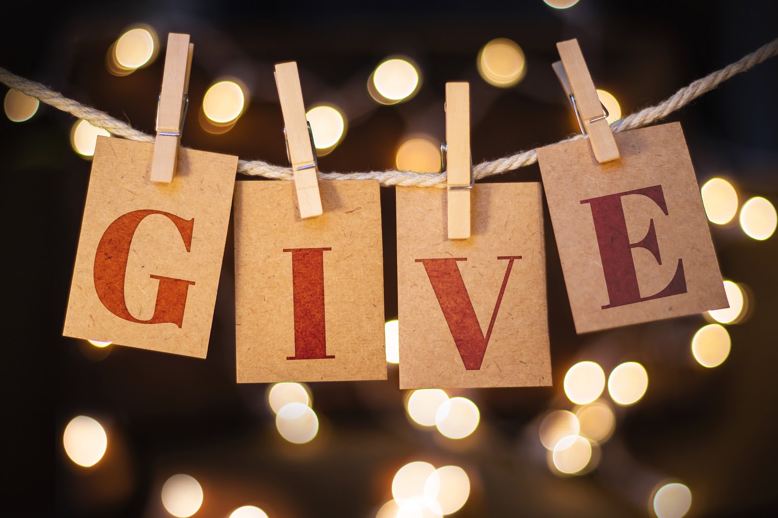 Donation request letter: Banner spelling out "GIVE"