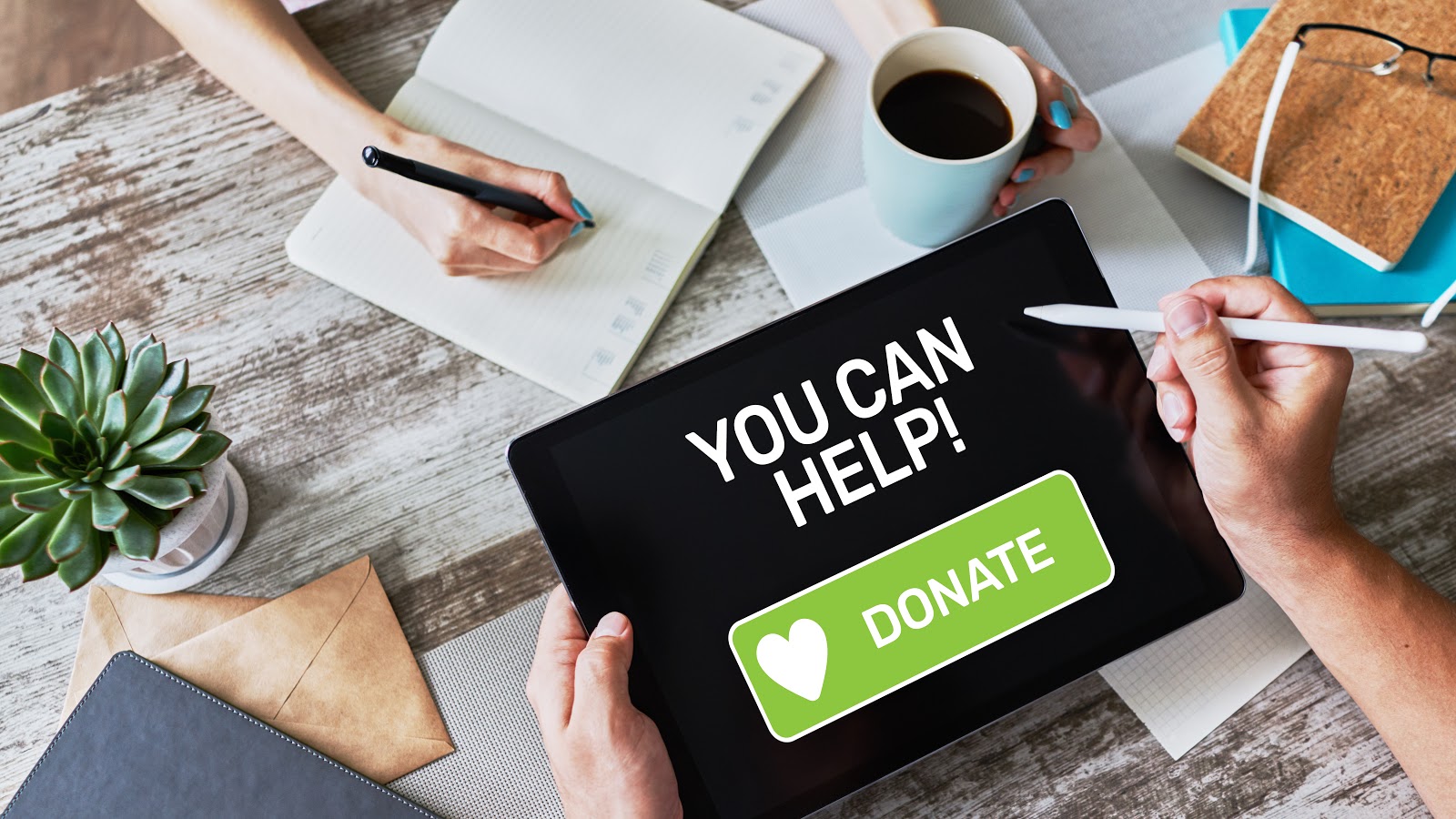 Virtual fundraising events: Tablet with "You Can Help" message and "Donate" button