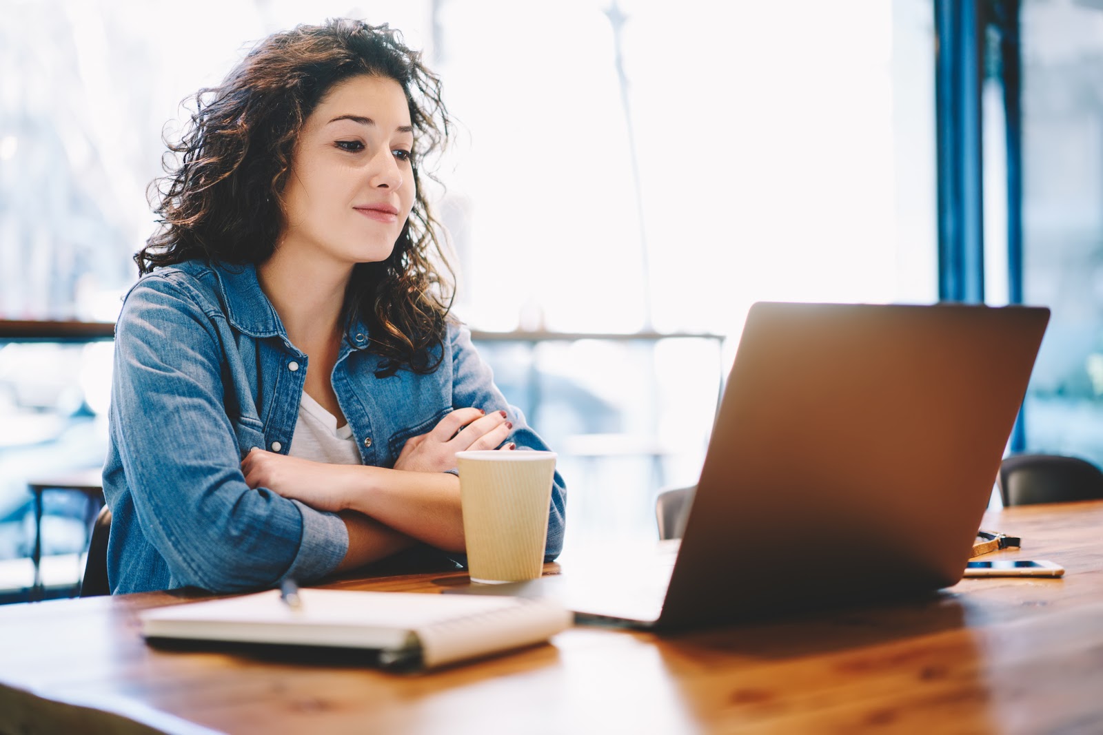Woman looking at her laptop