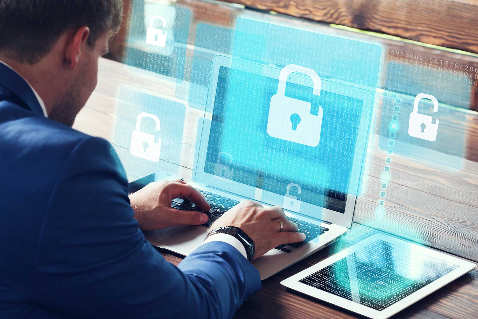 Man looking at a computer screen with a security lock on it