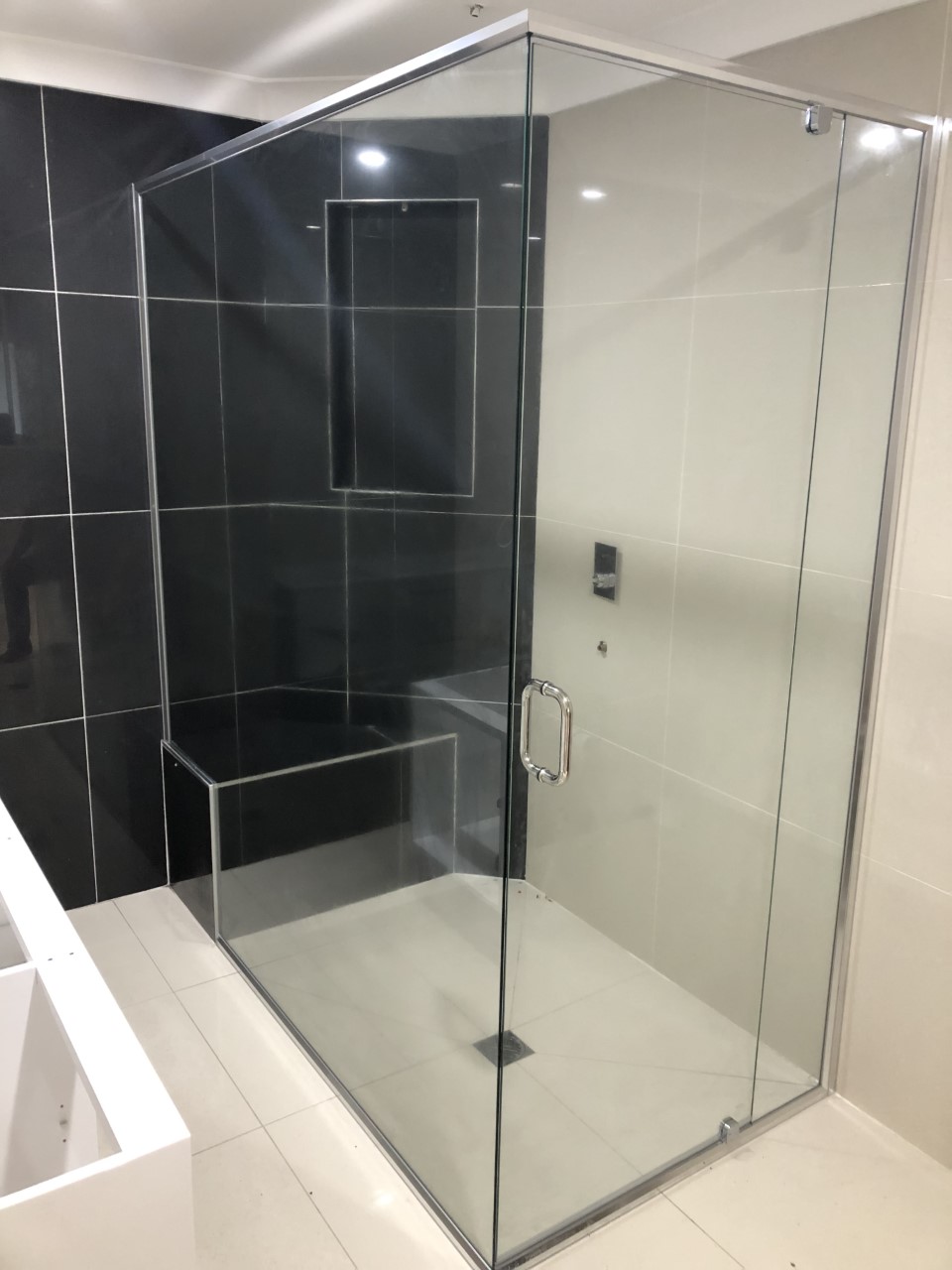 Semi-Frameless Pivot Door Shower Screens Brisbane | JRC Glass Solutions