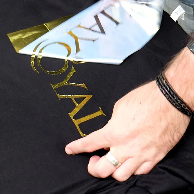 peeling away excess foil