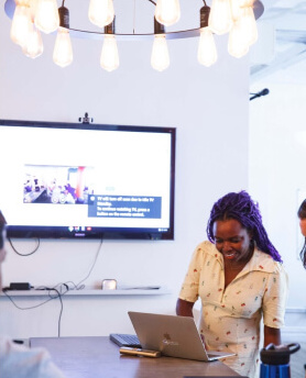 Image of a girl giving a presentation from her laptop