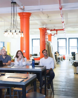 Image of people observing a presentation