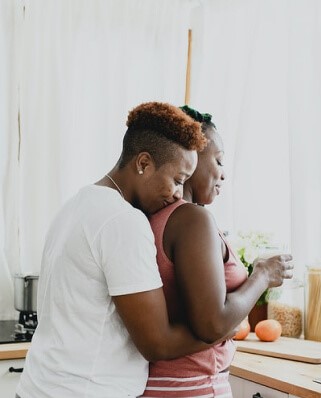 A couple holding each other and hugging