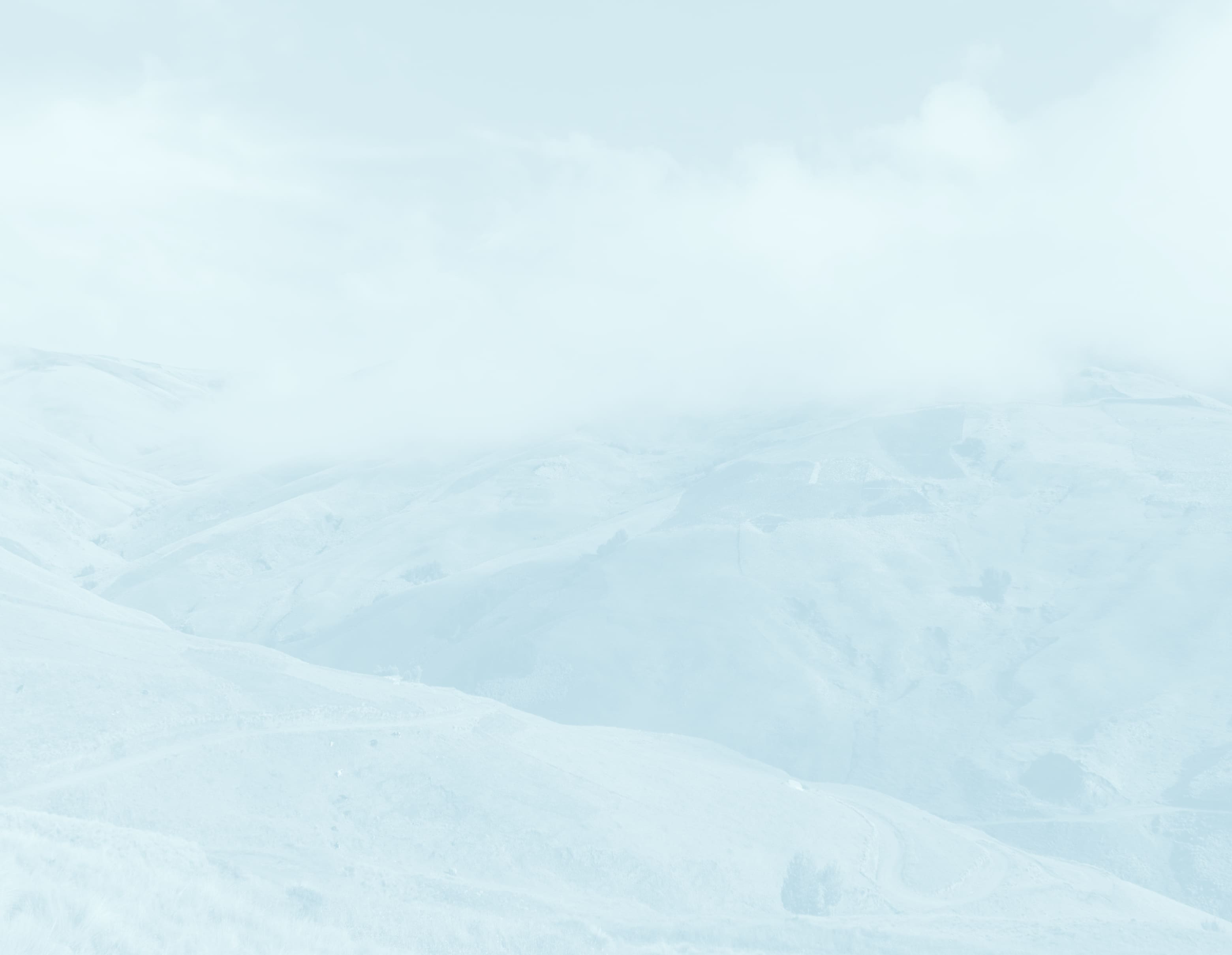 A faded outdoor landscape photo used as decorative background