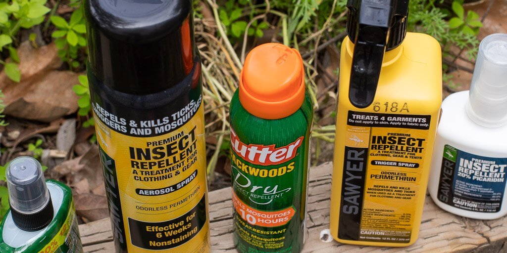 Selection of insect repellent brands and bottles