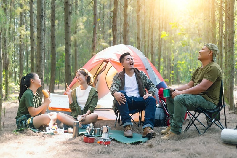 Family camping in forest