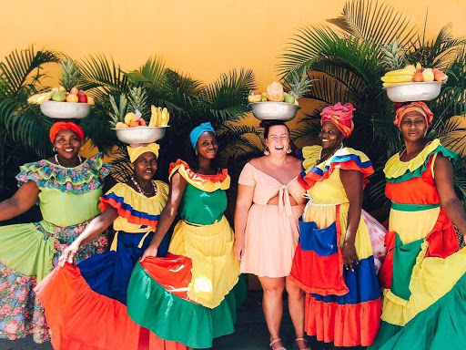 women dressed up smiling pediatric nurse lindsay riddell