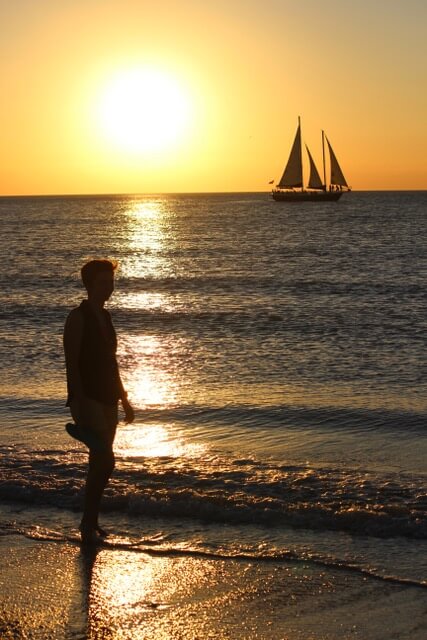 travel nurse enjoying sunset on travel assignment holmes