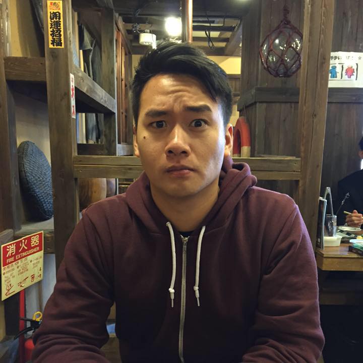 david sasda sitting at table in restaurant