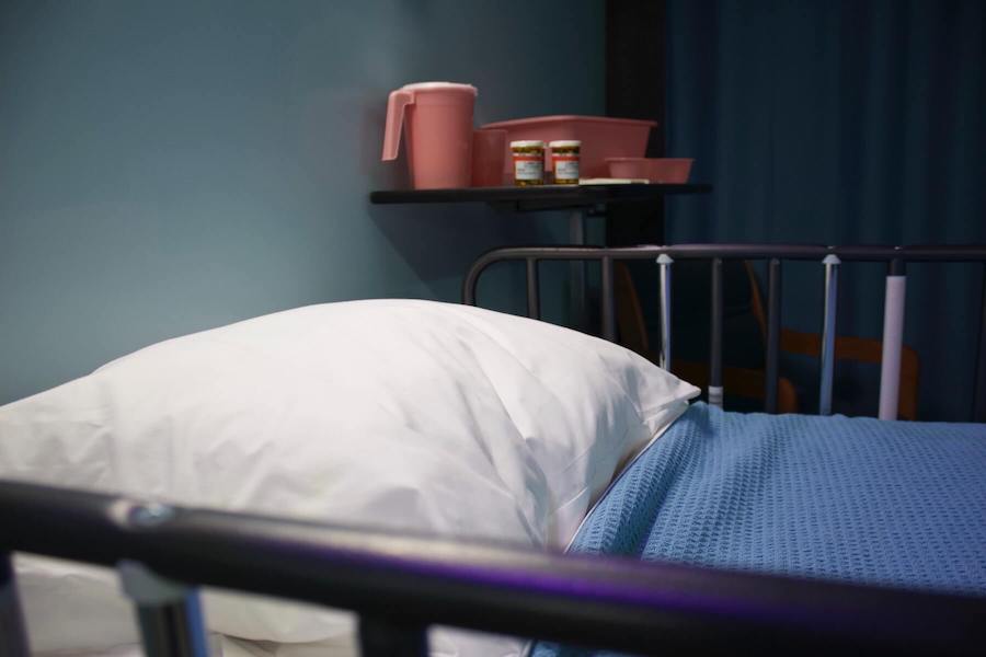hospital bed in foreground with medications in the background hospice nursing