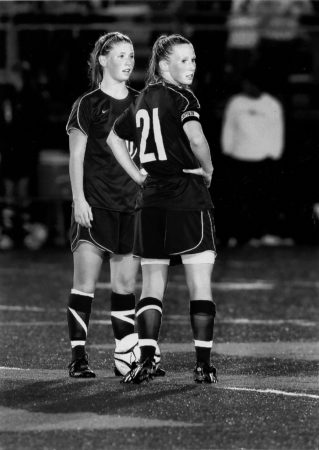 sister nurses sarah and annie gray playing soccer together