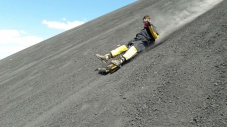 budget travel sliding down hill in nicaragua