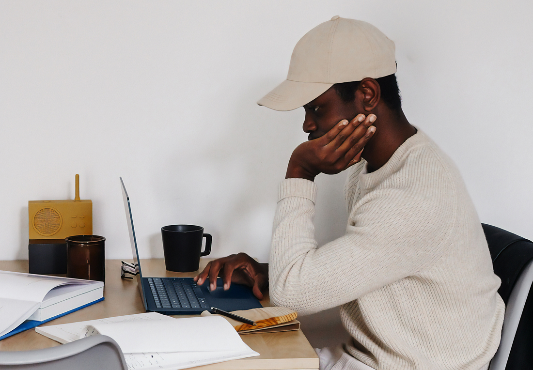 man looking at computer