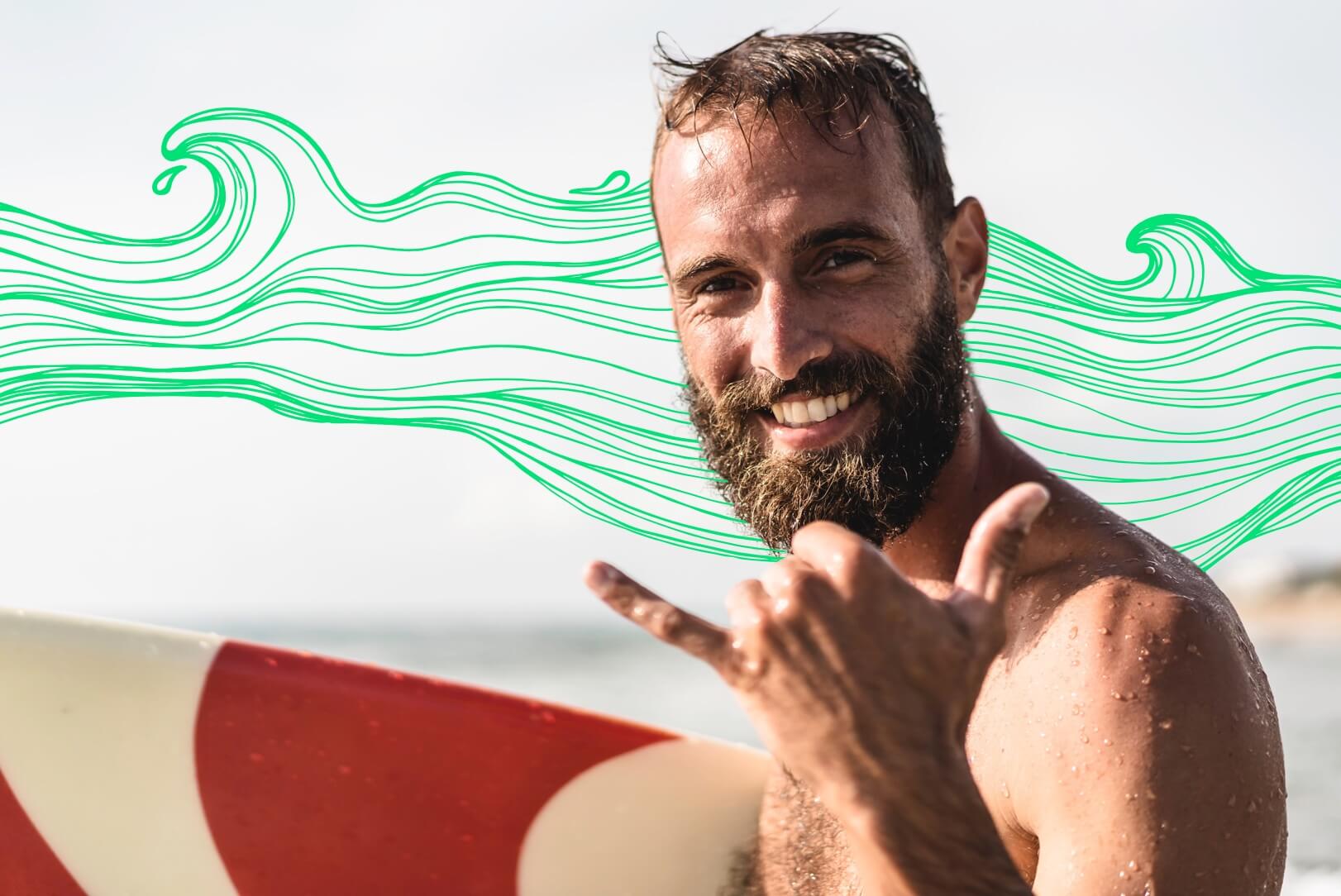 A person holding a surfboard and smiling while on their affordable vacation.