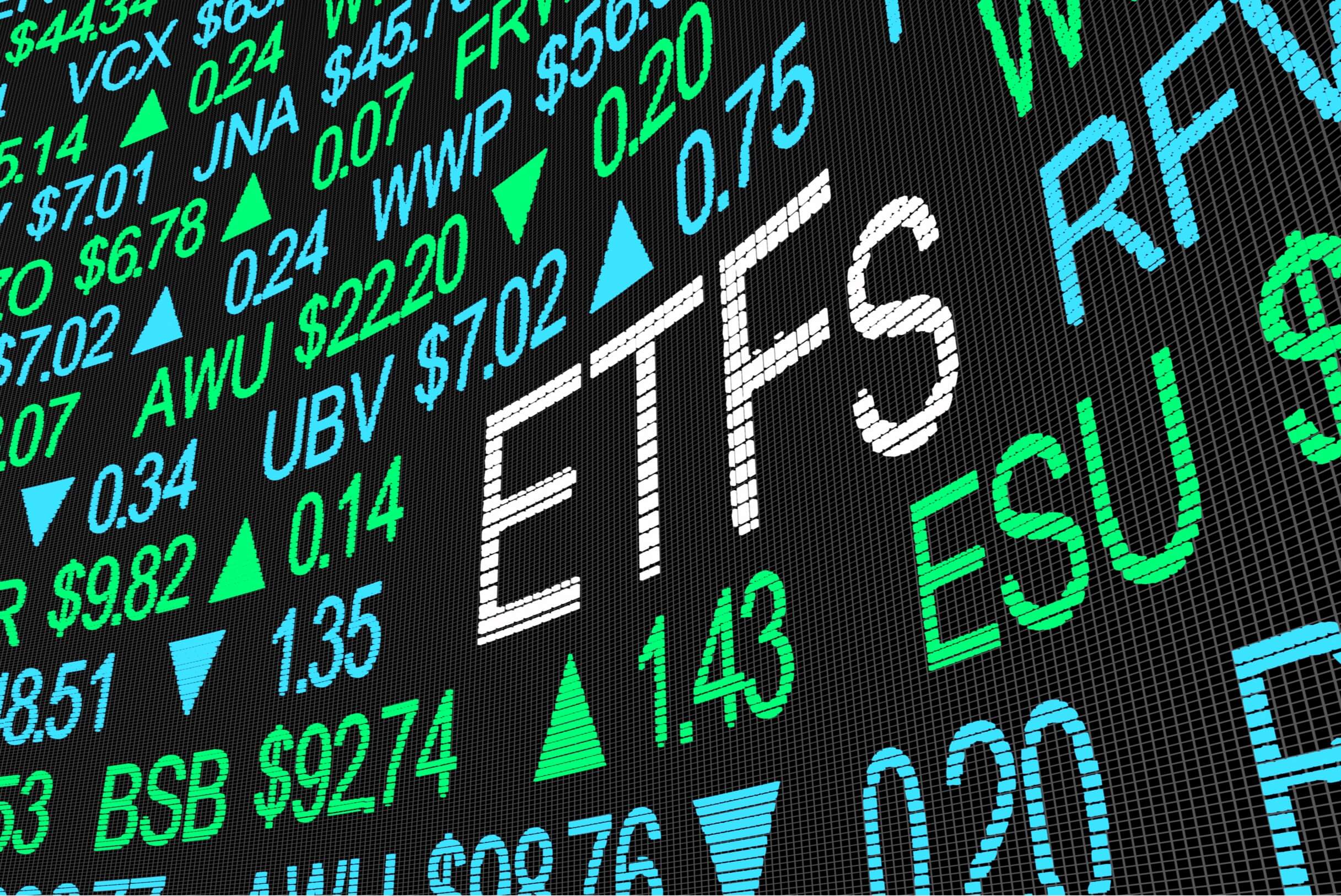 illustration of trading screen emphasizing the word ETF surrounded by tickers