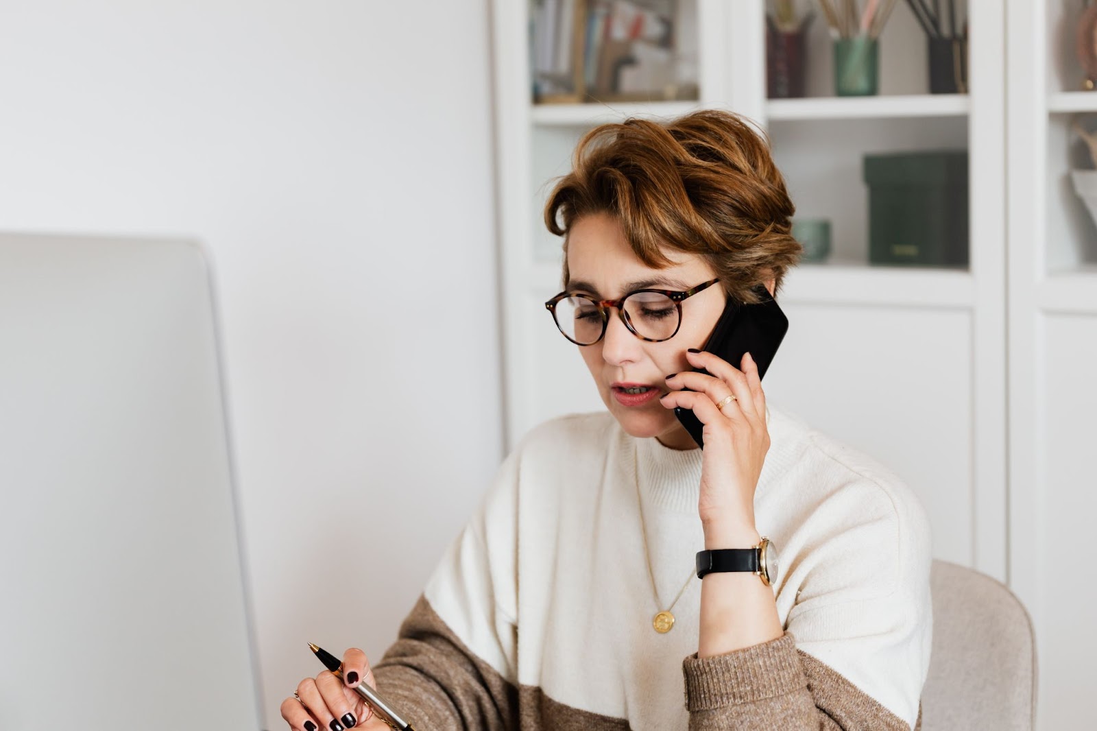 image of merchant on the phone solving problems